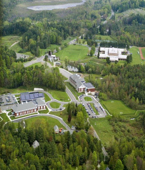 The Berkshire Hills Regional School District campus in Great Barrington: at lower left, Monument Valley Middle School, Muddy Brook Elementary School in the center, and Monument Mountain High School at the top right.