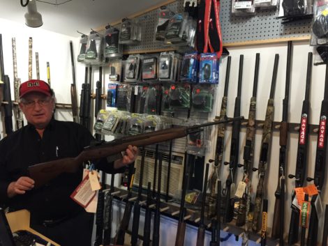 Richard Bailly holds the rifle he was trained to shoot while in the United States Army. Photo: Heather Bellow