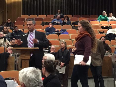 Vijay Mahida answers questions from the Selectboard, while Elizabeth Orenstein waits her turn to speak.