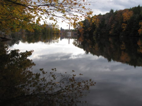 Rising Pond with the dam in the distance. The shore to the right in this photo is the property purchased by General Electric for possible use as a landfill for toxic PCB waste.