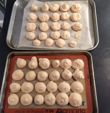 Trays of meringues, perfectly baked.