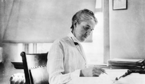 Henrietta Swan Leavitt, at her desk at the Harvard Observatory.