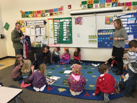 State Rep. Pignatelli presenting a new American flag to the kindergarten class. Photo: David Scribner