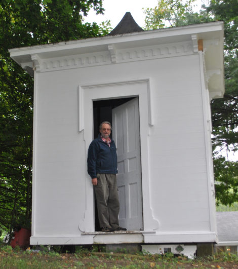 The author at the door of Charles Taylor's writing cabin. The author of this article saw no unpublished manuscripts when he peeked inside Taylor’s cabin. Photo: Gary Leveille