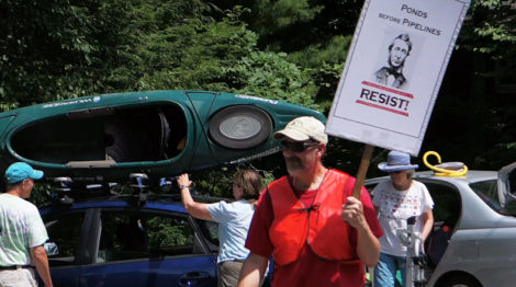 Pipeline opponents arrive at Lower Spectacle Pond for a solidarity rally over Tennessee Gas’ plans to construct a three-mile gas storage loop in state-owned conservation land in Otis State Forest. Photo: Ben Hillman