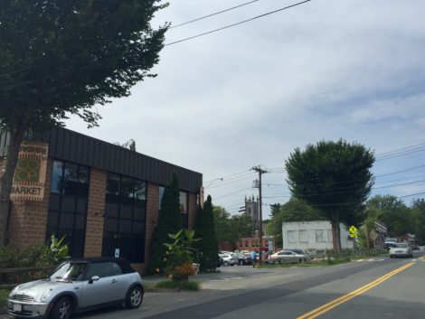 In a view looking toward Bridge Street the Berkshire Co-op, at left, will move to a new 14,500-square-foot building at the site of its current parking lot and former Laramee's Cleaners block. The current building will be razed for a parking area. The development will feature condos and retail and office space. Photo: Heather Bellow
