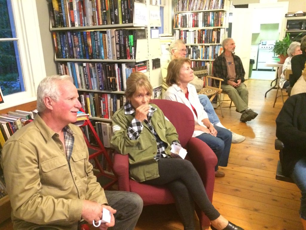 Ellis Gross and Pat Pyle enjoy their popcorn in anticipation of the start of the movie. Photo: Dianne Salamon.