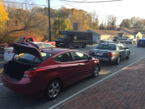 Police had searched this red sedan parked in front of Domaney's. Photo: Heather Bellow 