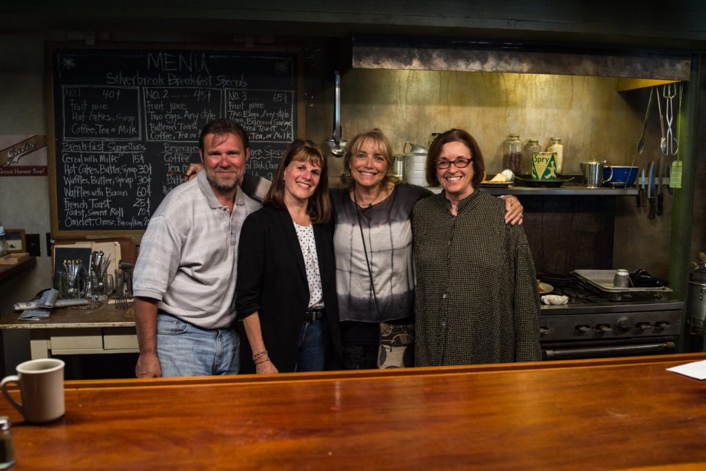 Producers Brian Long and Diane Pearlman, director Karen Allen and production designer Kristi Zea on the 1947 diner set.