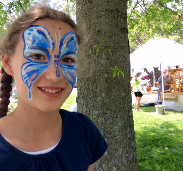 A child enjoys the activities at a recent Summer in Spencertown celebration. Photo: Robyn Perry Coe