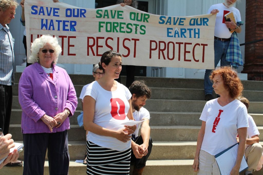Anastasia Lawton-Sticklor of the Three Mountain Affinity Group in Leominster makes a statement on the steps of the courthouse. Photo: Terry Cowgill