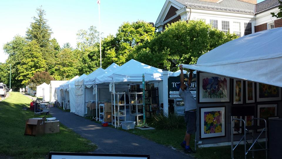 Artisans prepare for the 2016 Stockbridge Summer Arts and Crafts Show. Photo courtesy Stockbridge Chamber of Commerce