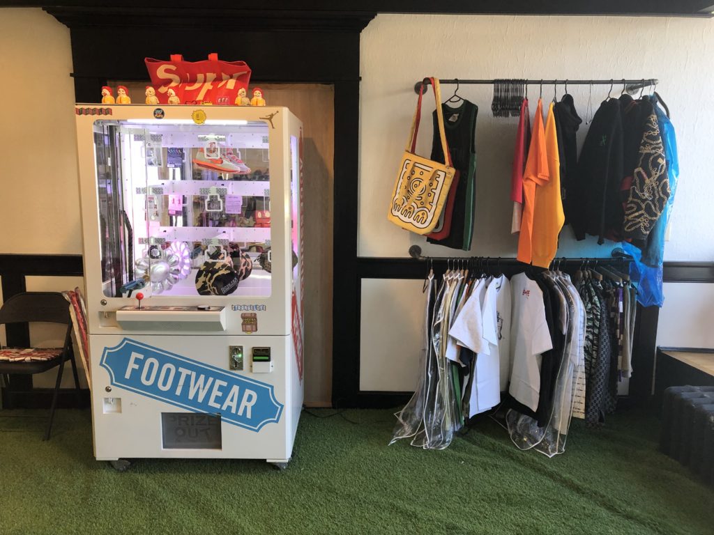 A toy machine and collectible clothes