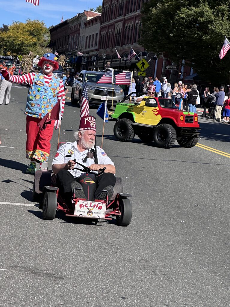 Of course a parade features small cars and clowns! Photo by Jodie Gordon.